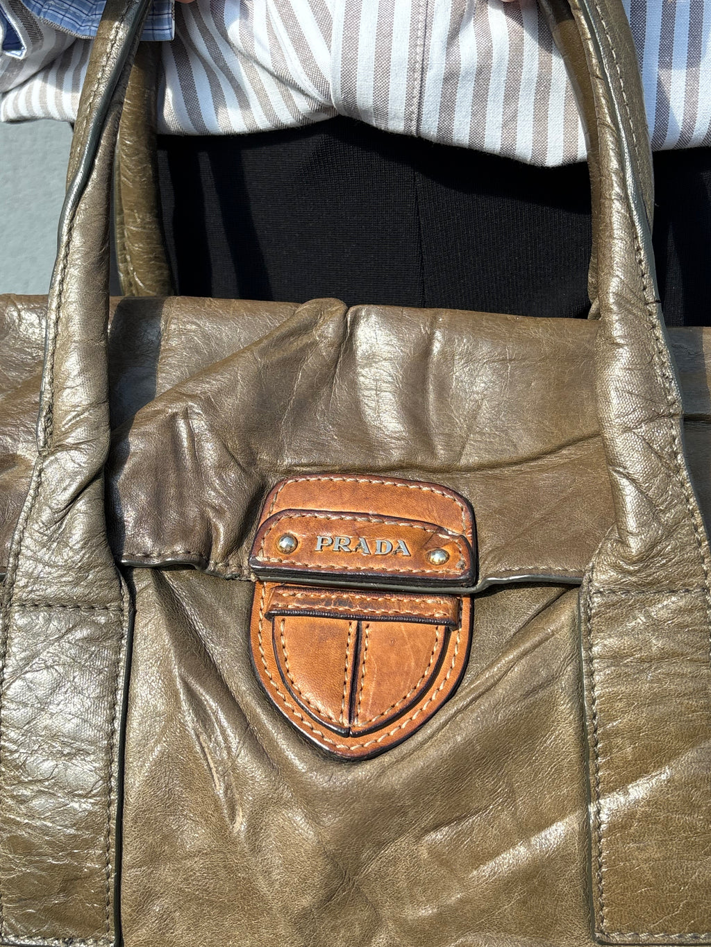 Vintage old leather khaki green Prada bag