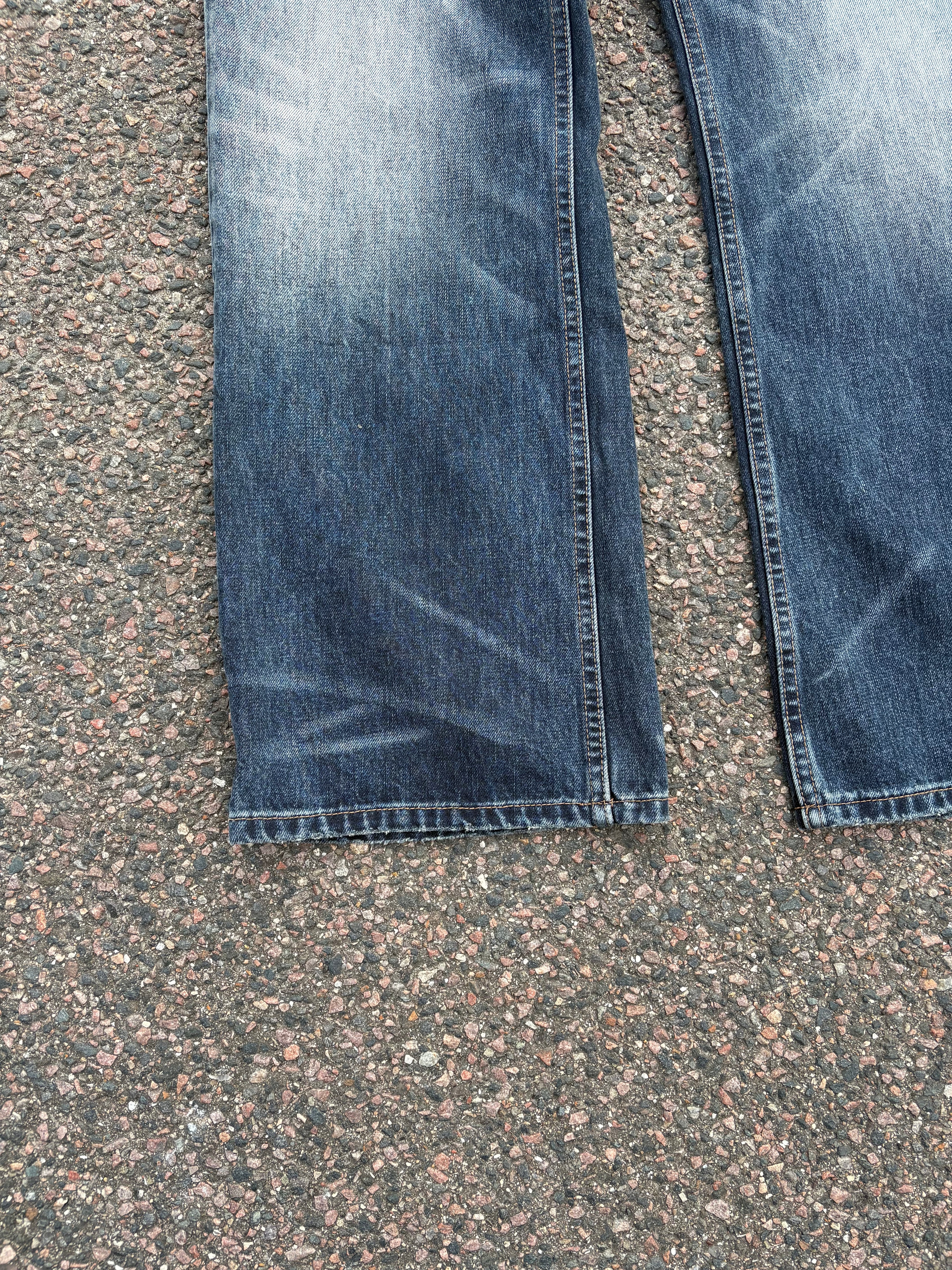 Vintage distressed bootcut jeans