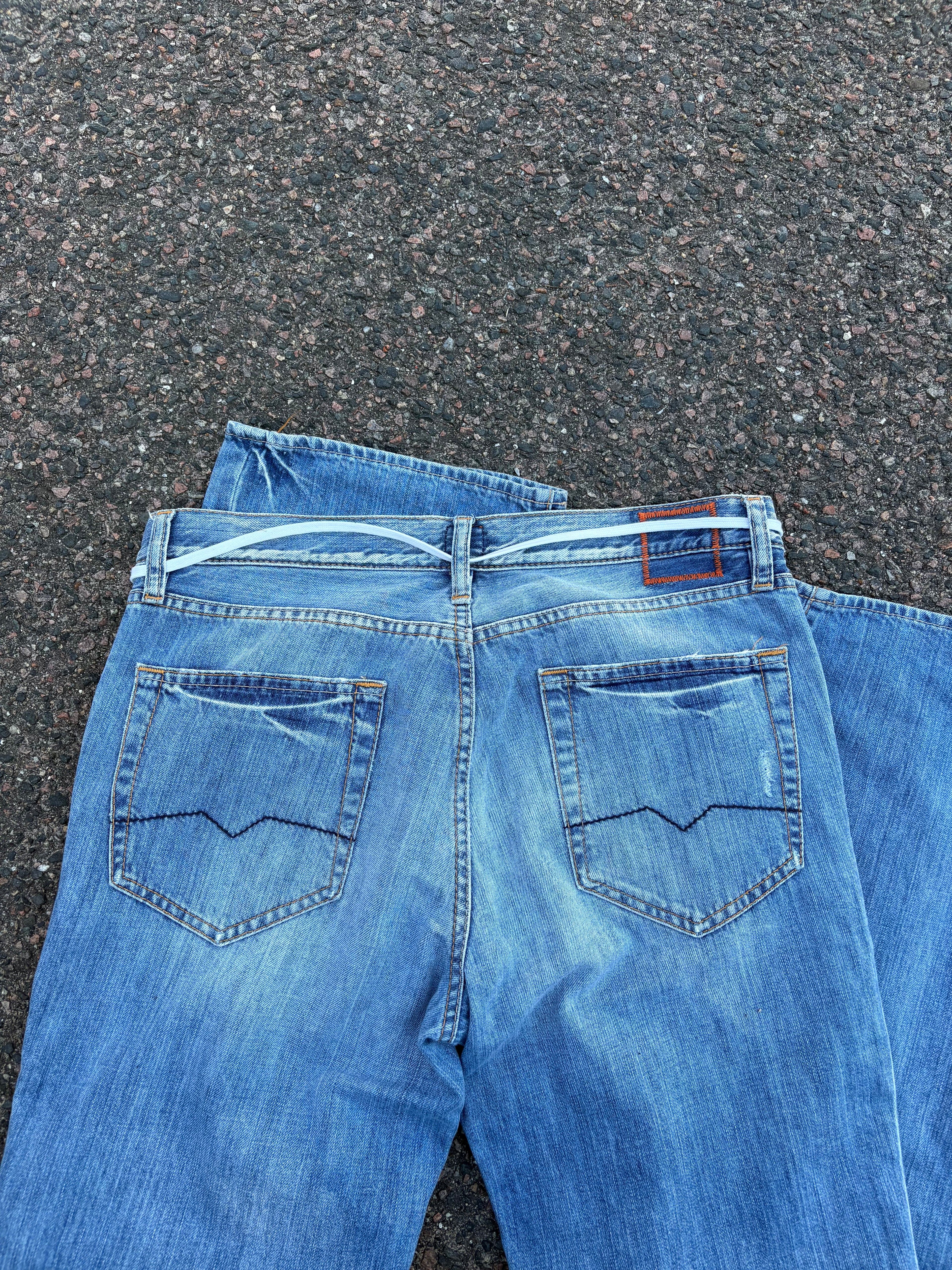 Vintage 1990s bootcut Hugo boss distressed blue jeans