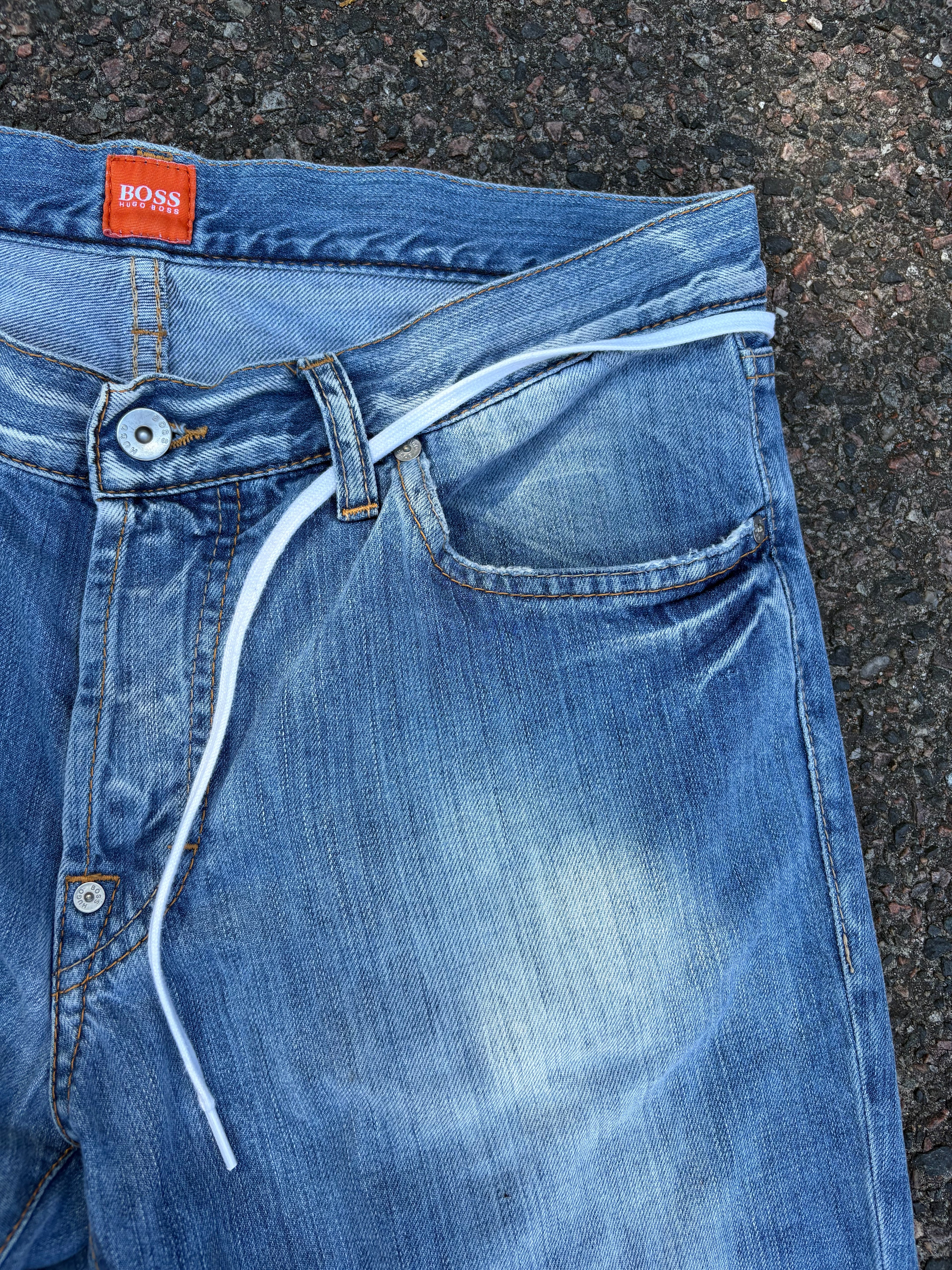 Vintage 1990s bootcut Hugo boss distressed blue jeans