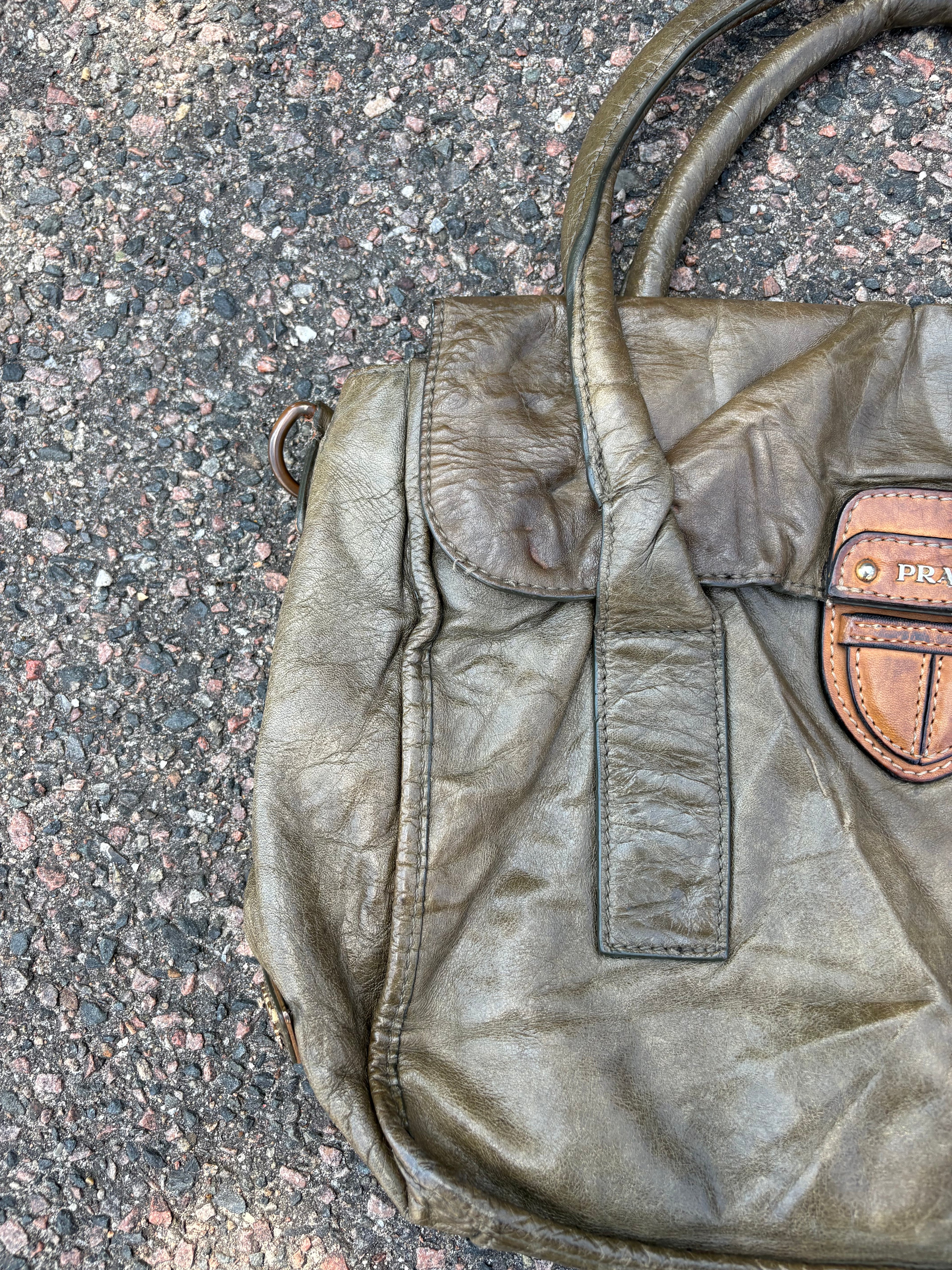 Vintage old leather khaki green Prada bag
