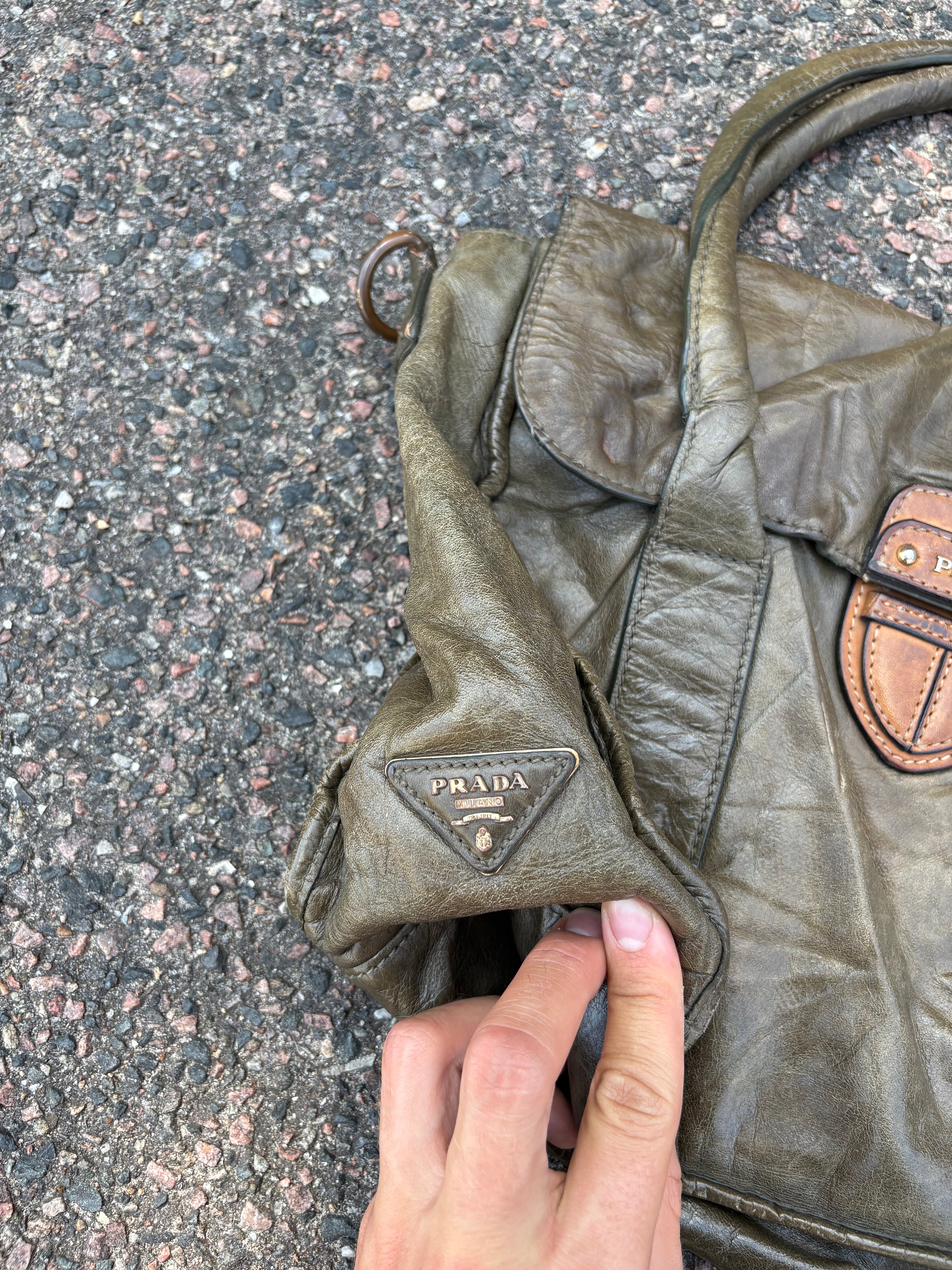 Vintage old leather khaki green Prada bag