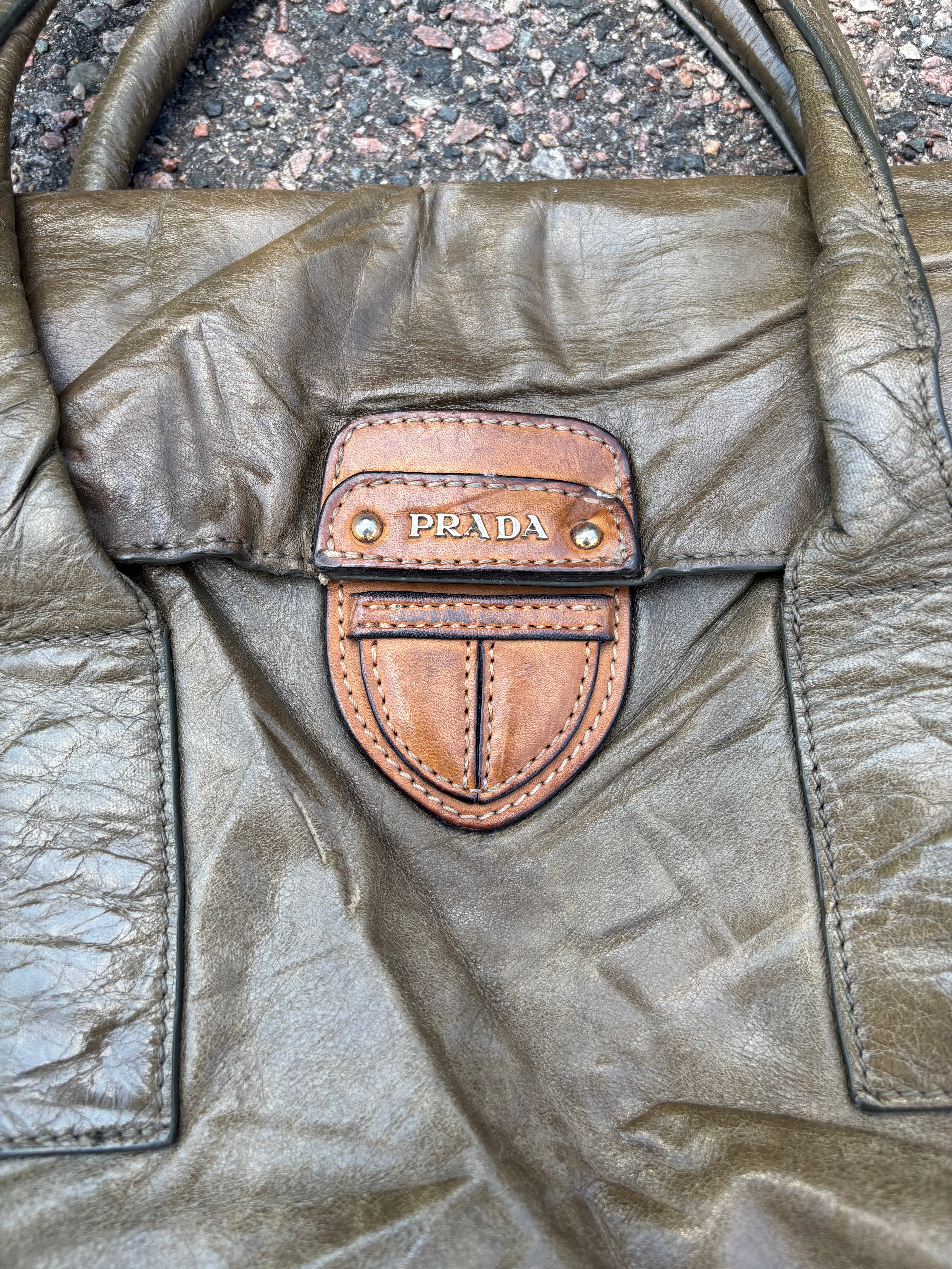 Vintage old leather khaki green Prada bag