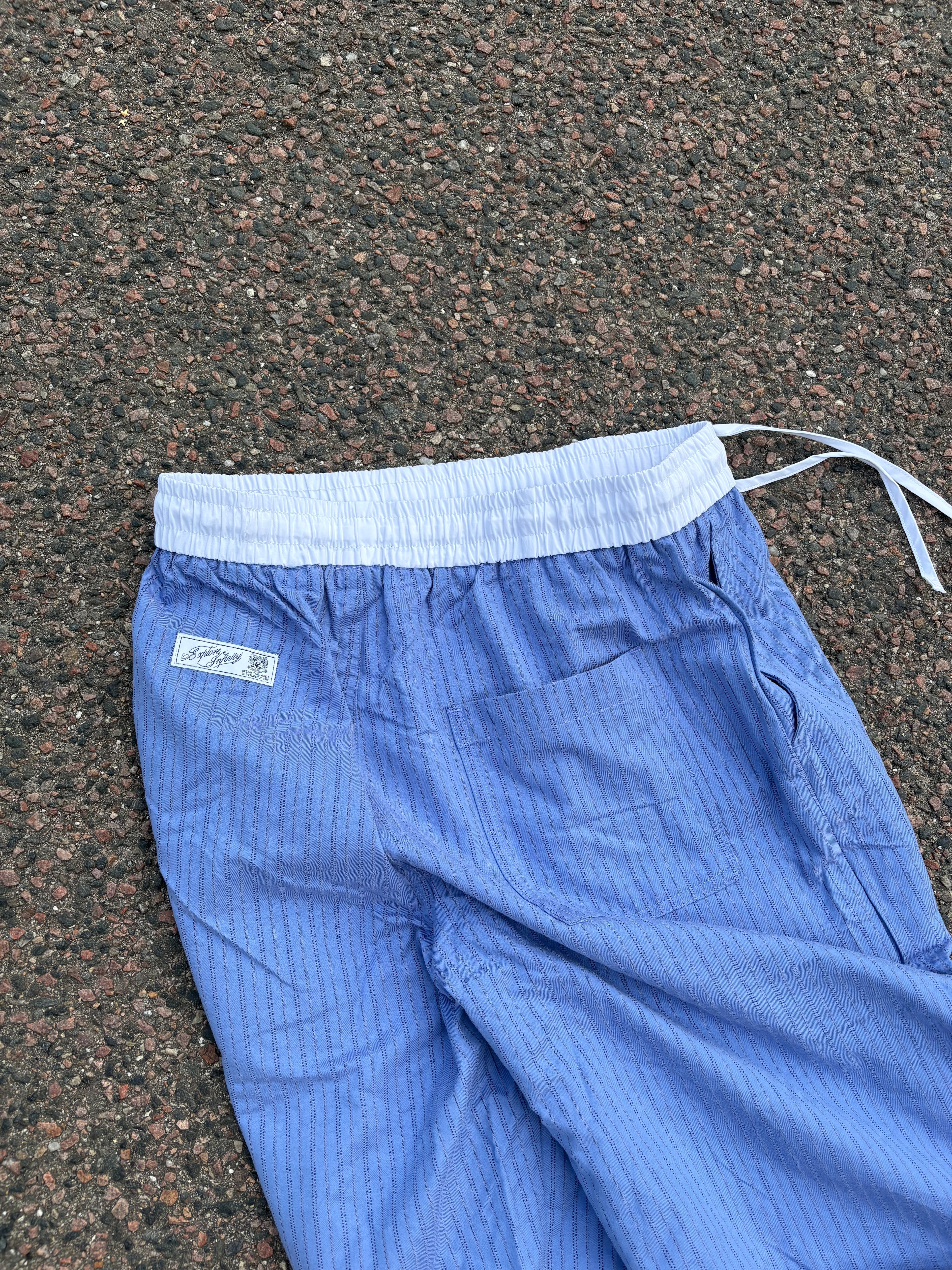 2000s Vintage blue striped white waistband pants