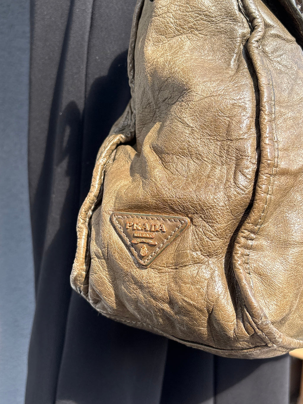 Vintage old leather khaki green Prada bag