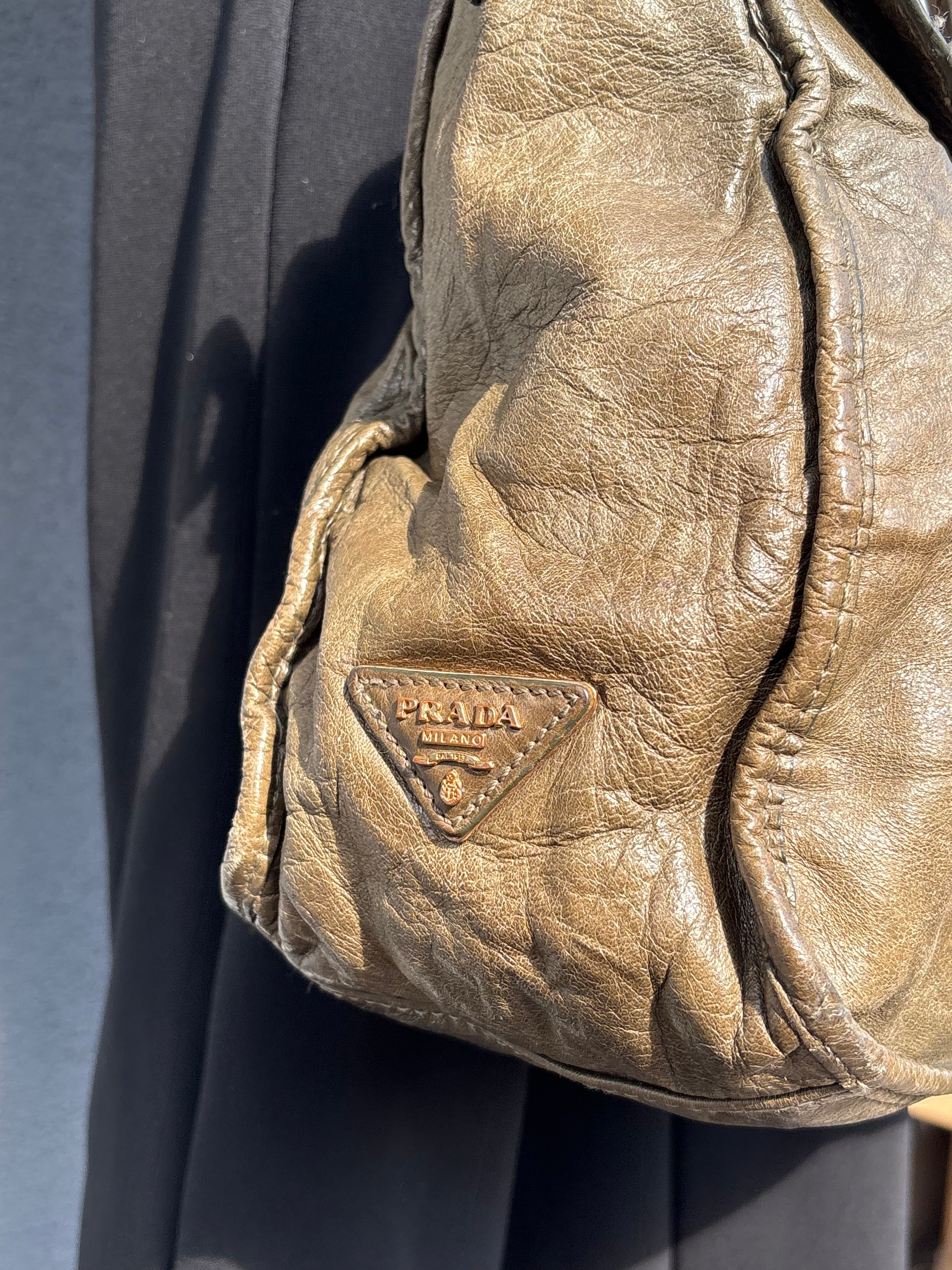Vintage old leather khaki green Prada bag