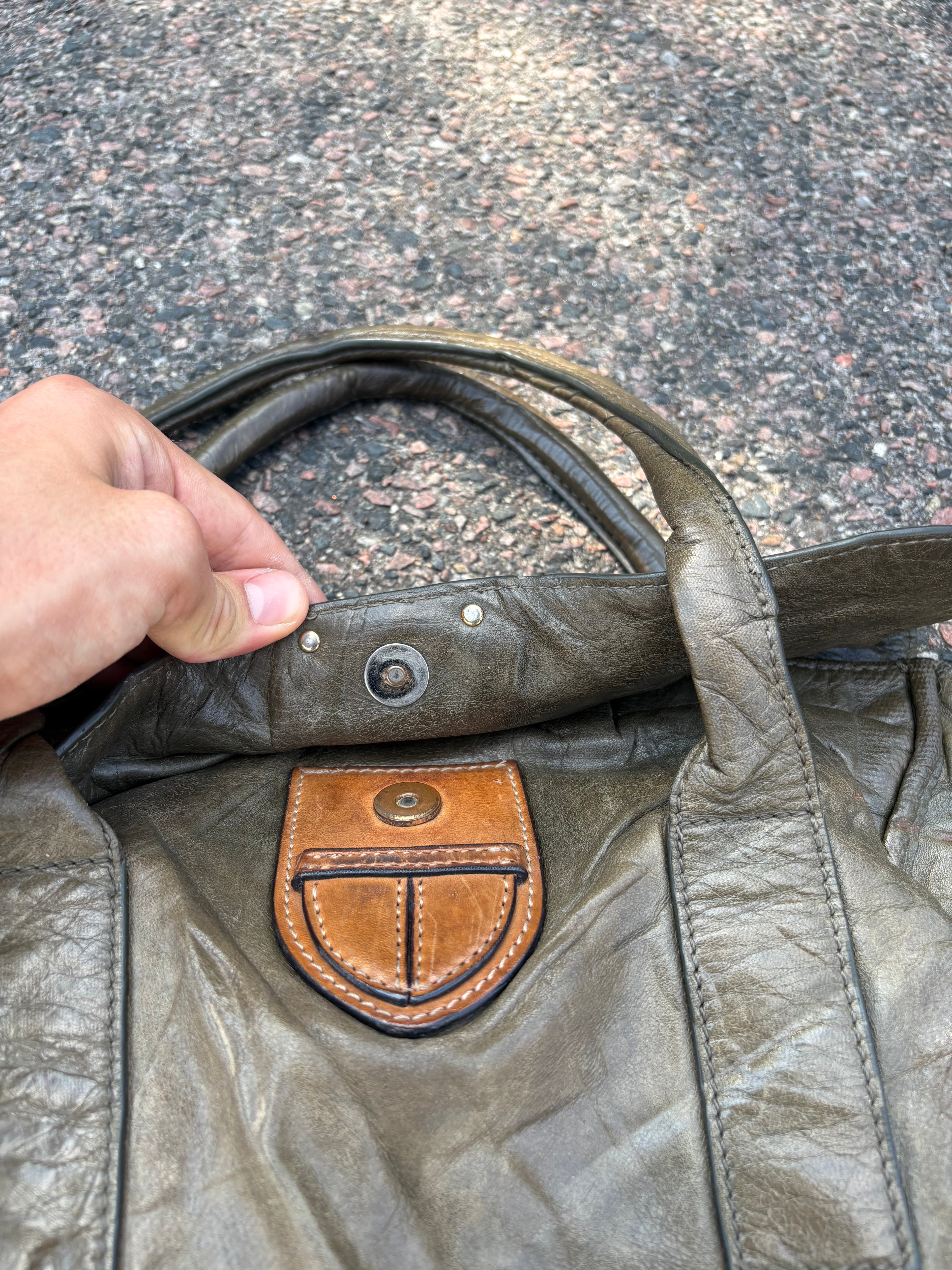 Vintage old leather khaki green Prada bag